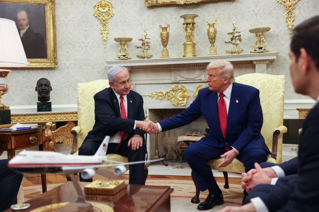 President Trump and Prime Minister Netanyahu shaking hands in the Oval Office.