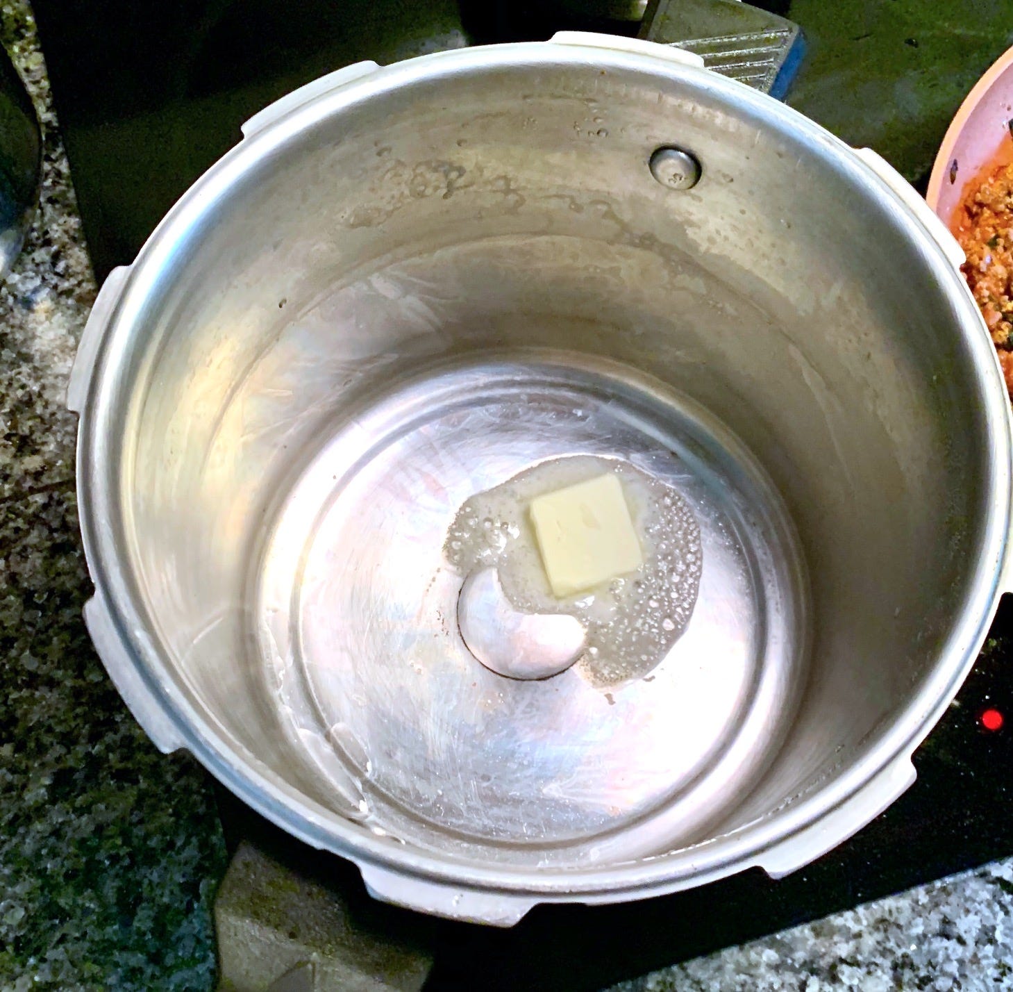 Butter in a pot over the stove