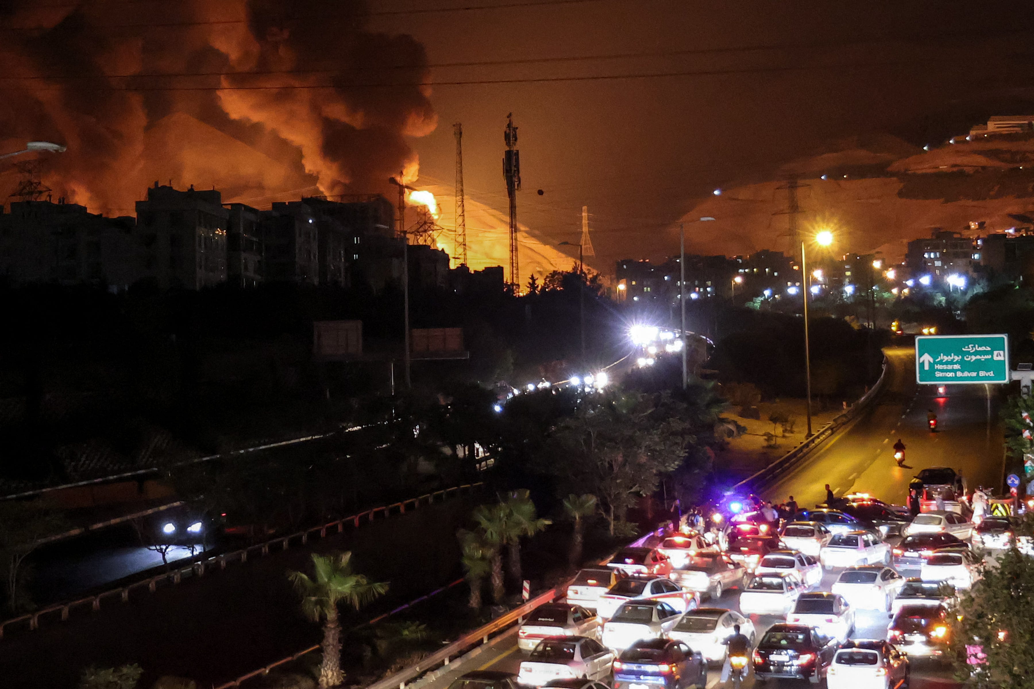 Smoke rises in Tehran after Israel dropped bombs.