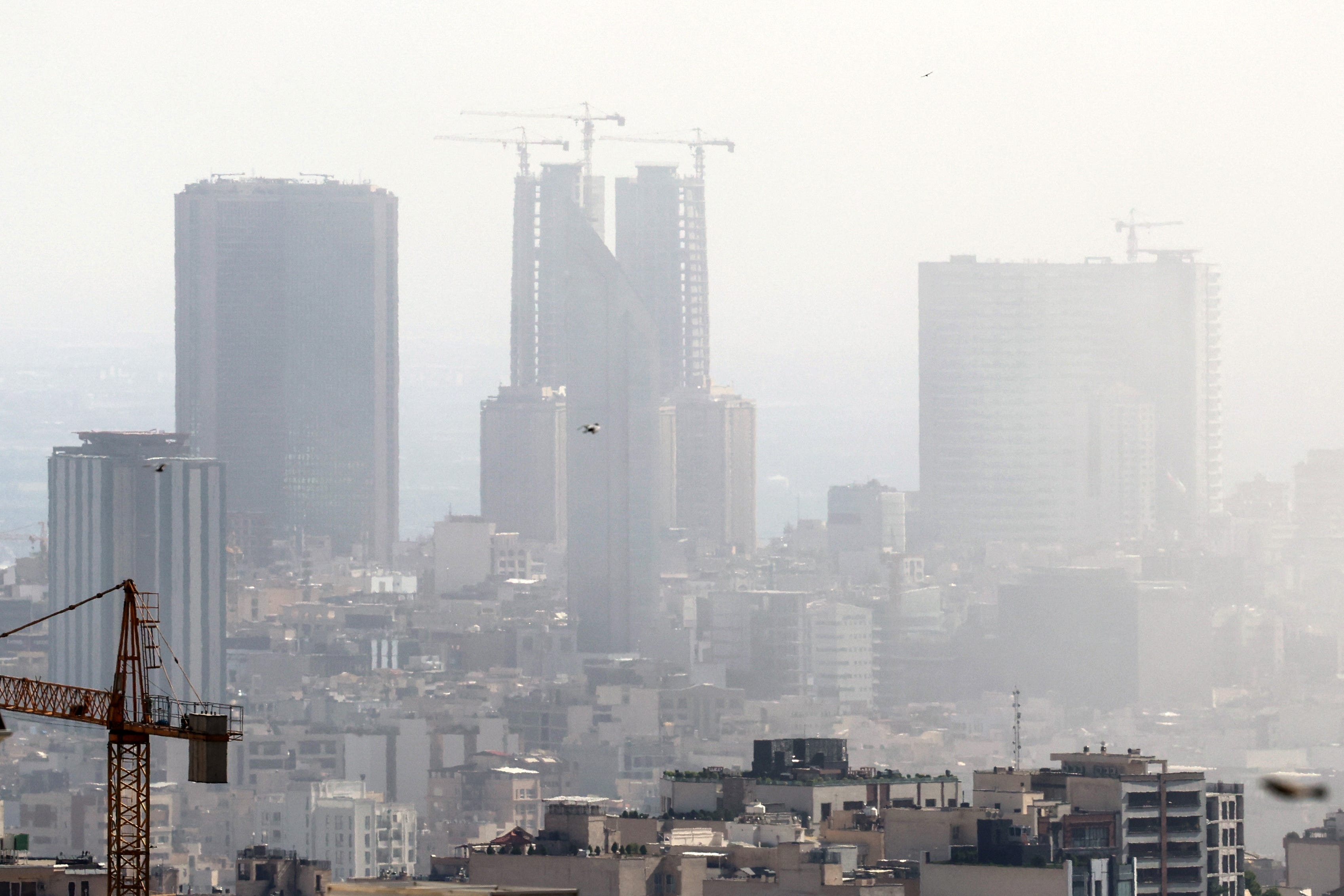 Smoke in the sky above Tehran