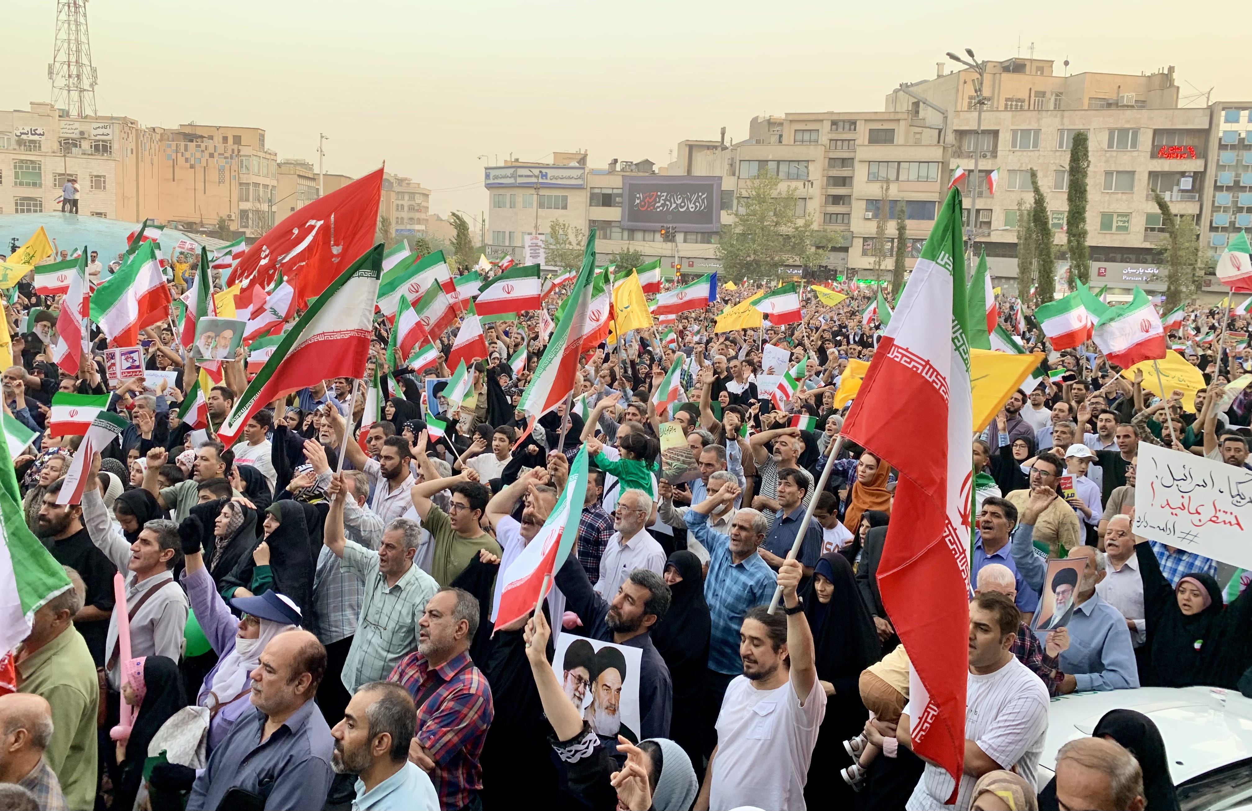 Iranian citizens celebrate the ceasefire between Iran and Israel.