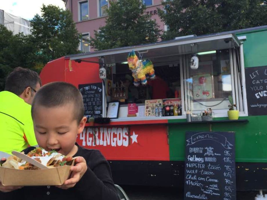 The writer's son eating 'gringo tacos' in Norway.