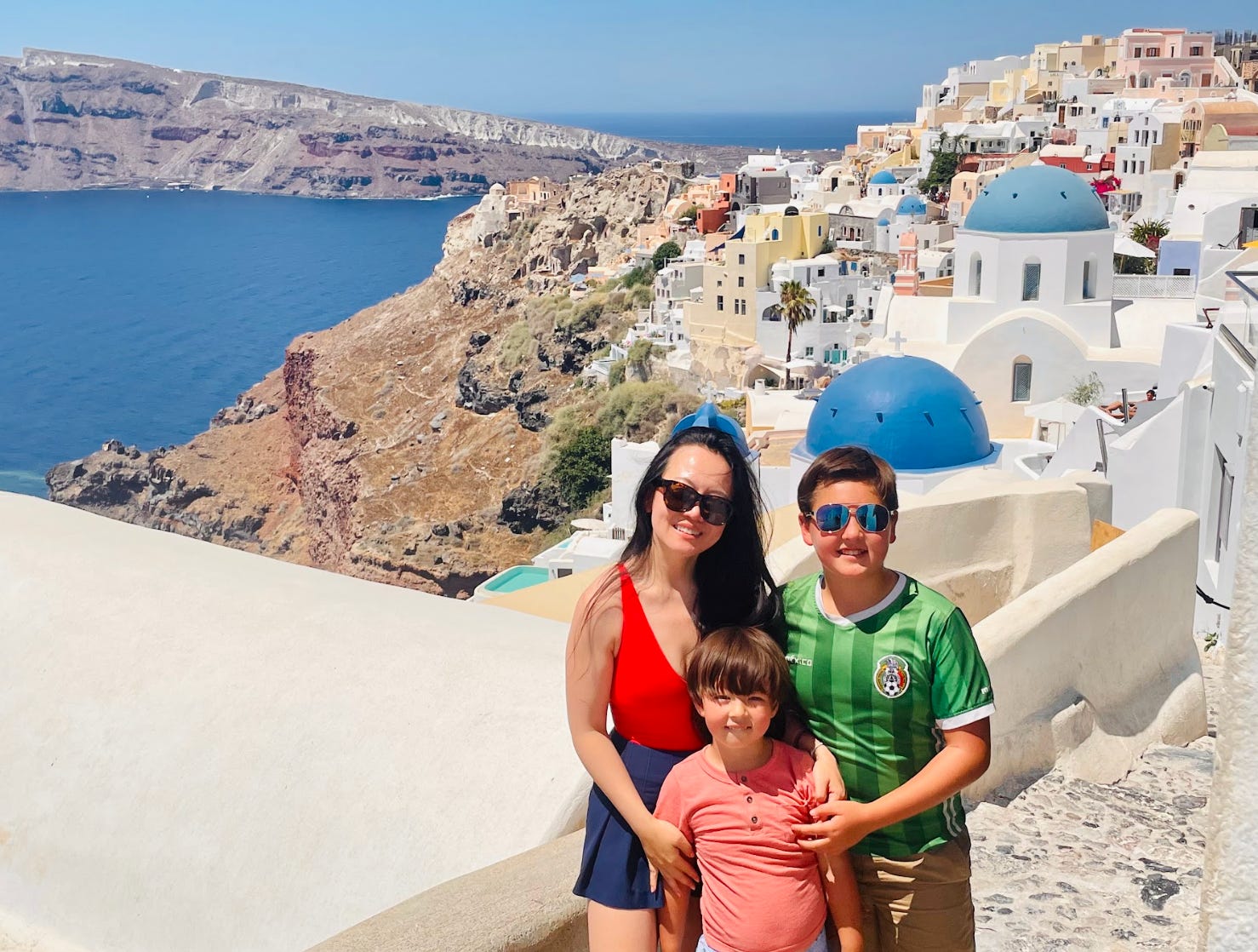 The writer and her children on a day trip to Santorini.