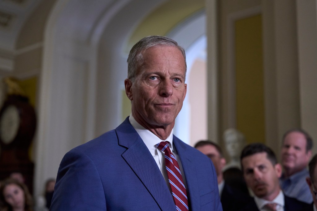 Senator John Thune speaking at a news conference.