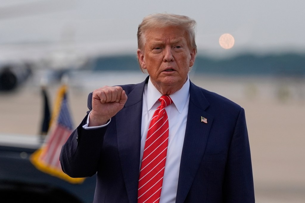 Donald Trump gesturing.
