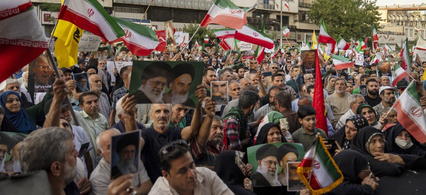 Iranian protesters chant slogans in Revolution Square to protest US attacks on nuclear sites in Iran on June 22, 2025, in Tehran, Iran.
