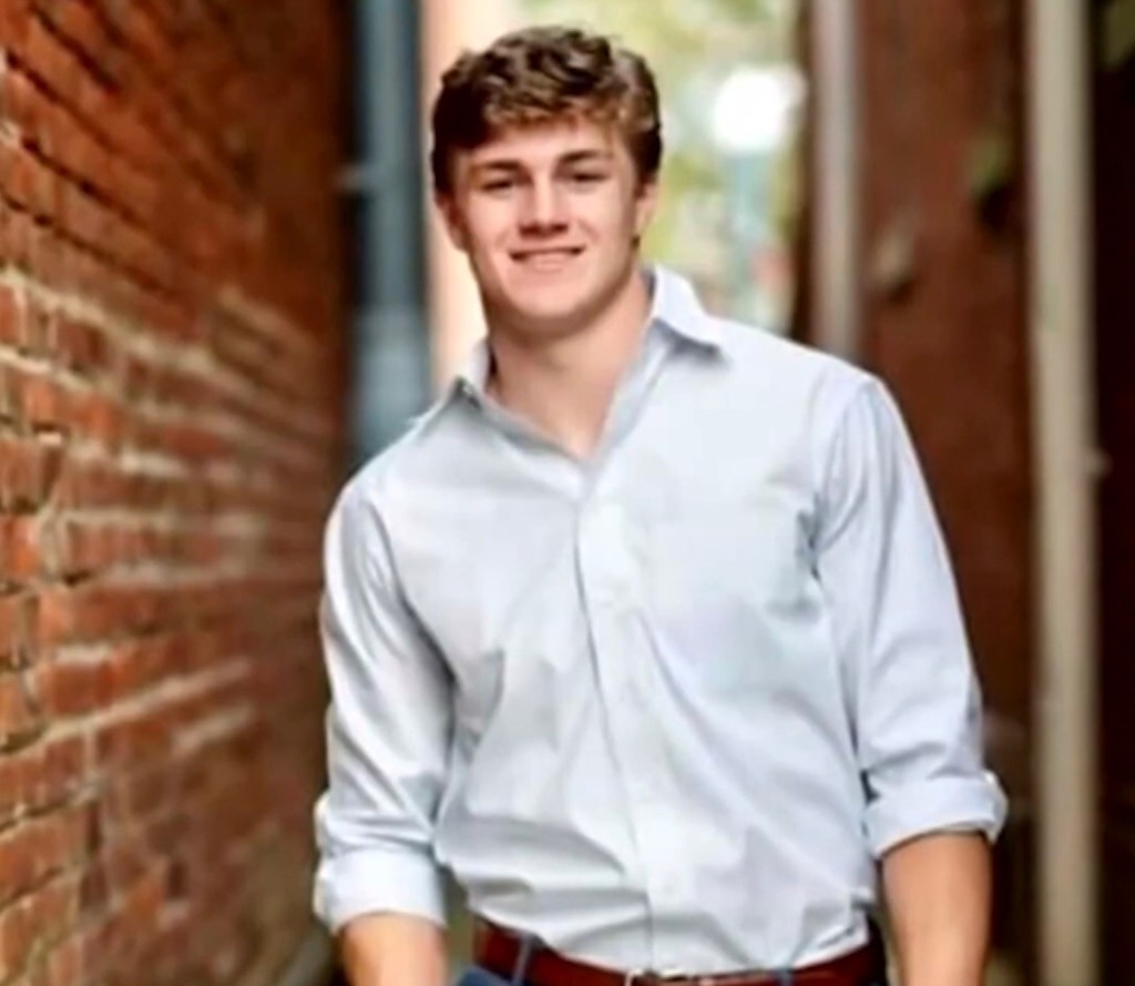 Smith was shot a third time as he lay on the sidewalk.