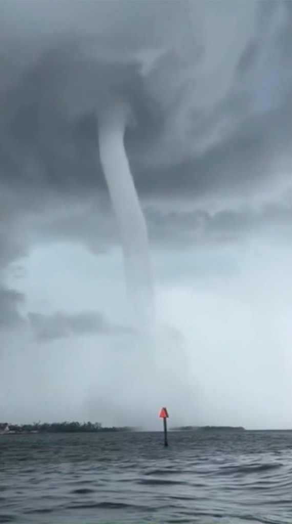 Waterspout over water.