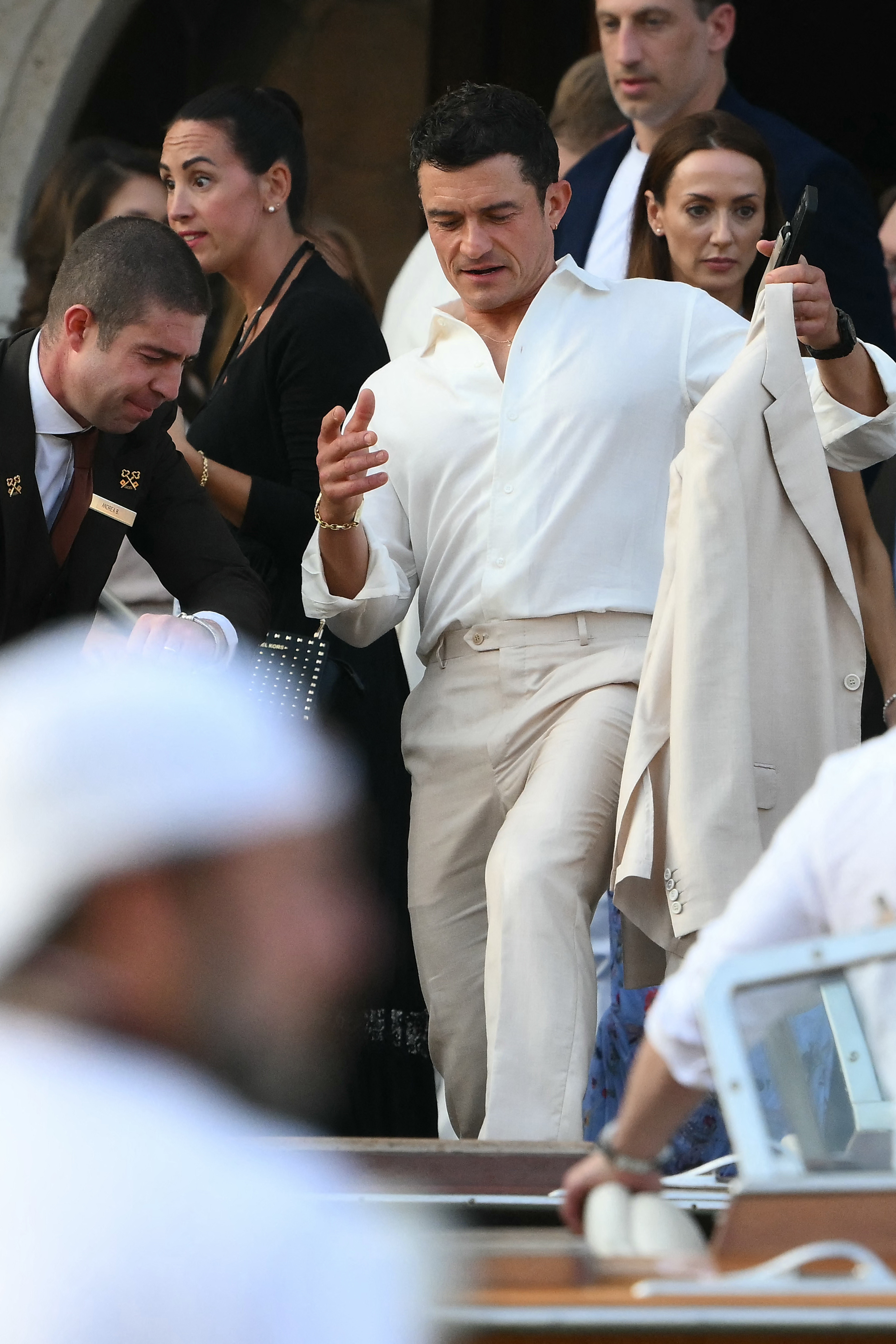 Orlando Bloom gets on a taxi boat at the Gritti Palace Hotel.