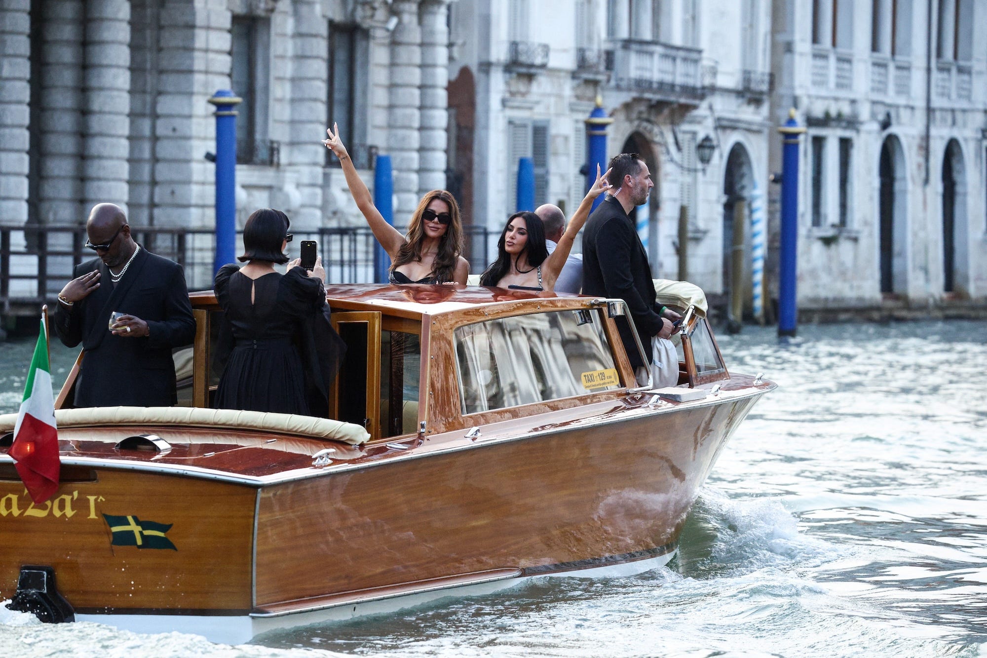 The Kardashian family heads to an event for Jeff Bezos and Lauren Sánchez's wedding in June 2025.