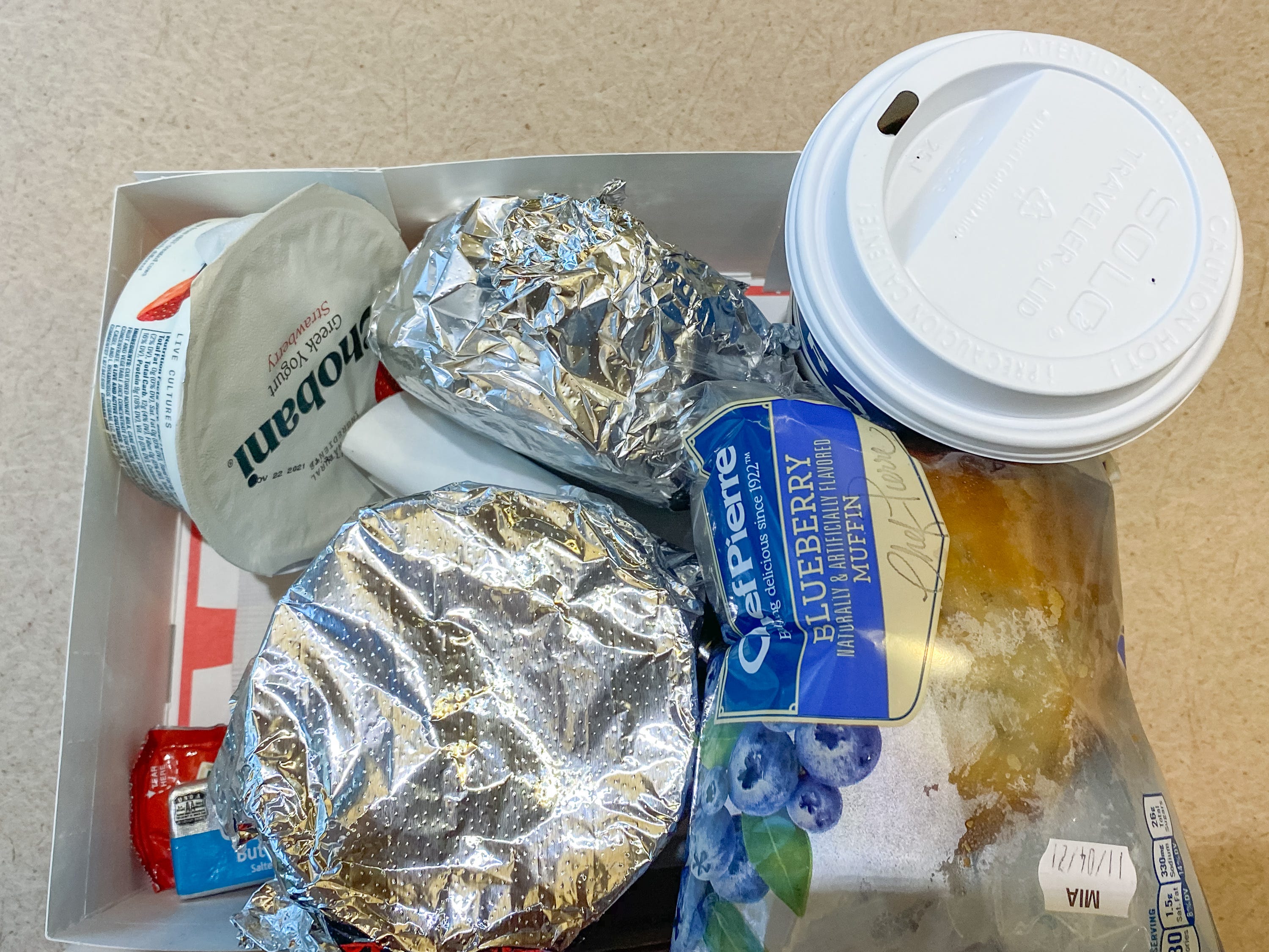 A breakfast tray on a beige counter top on the amtrak train