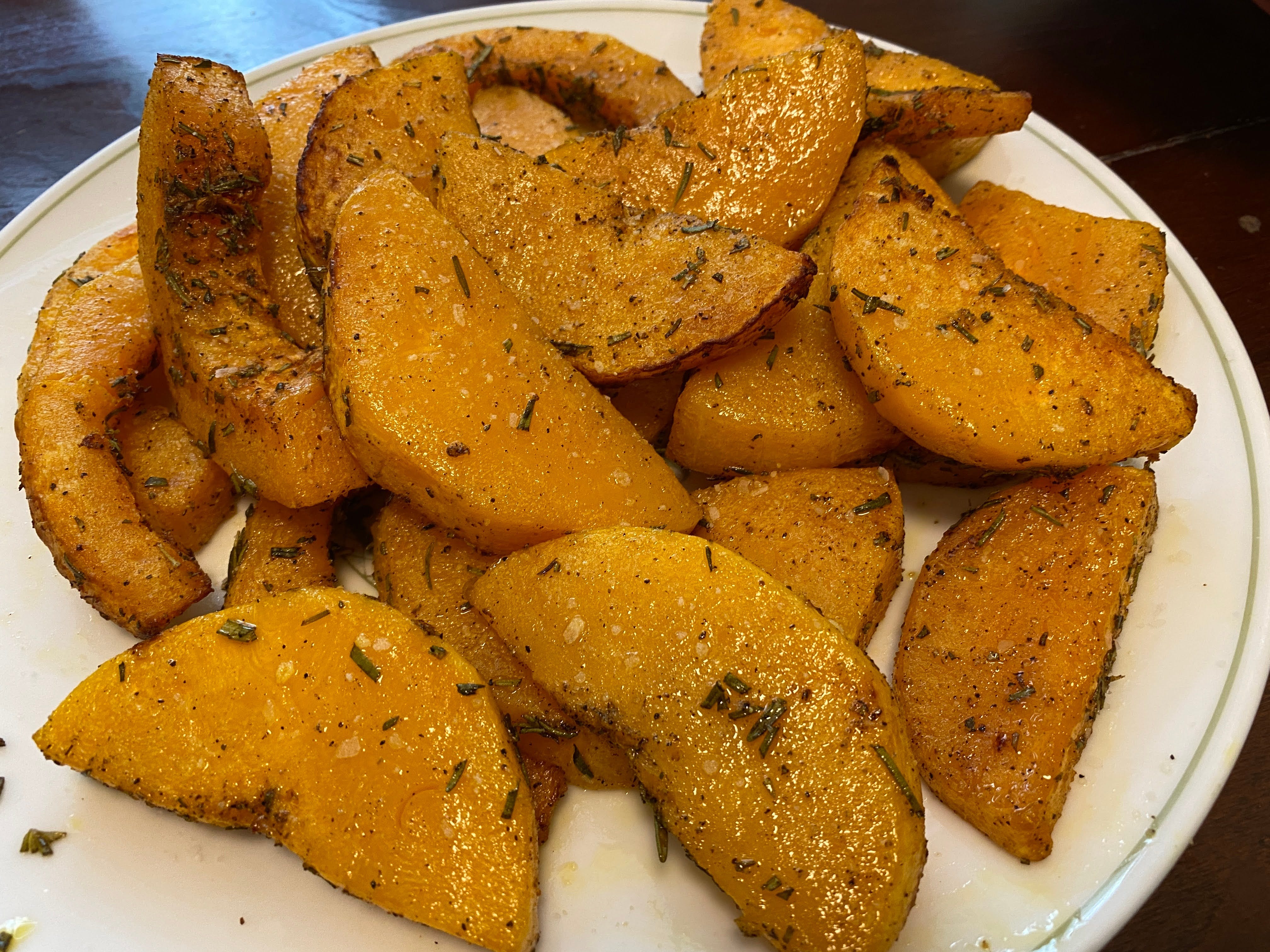 A photo of cooked butternut squash on a plate