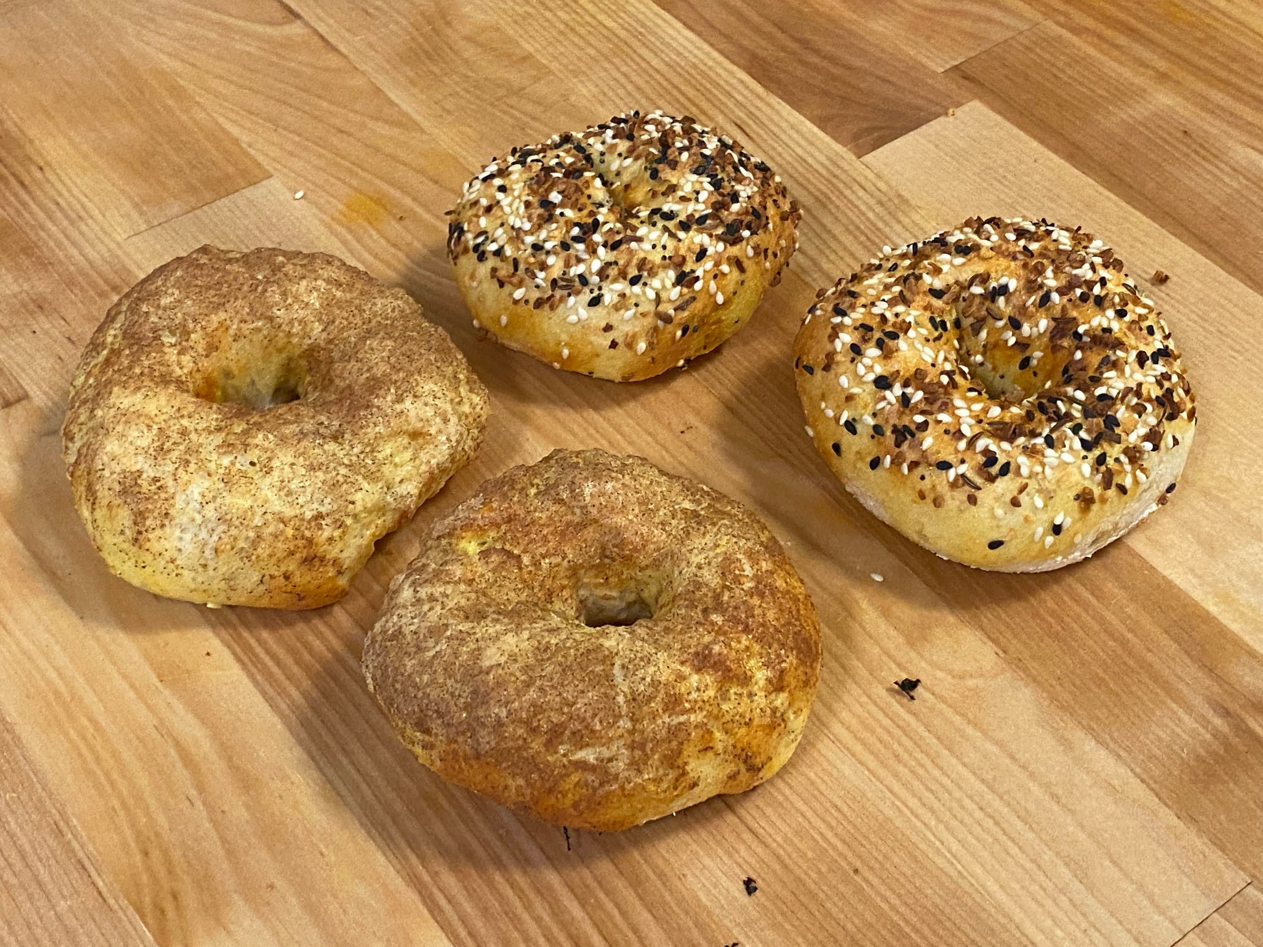 A photo of bagels on wood
