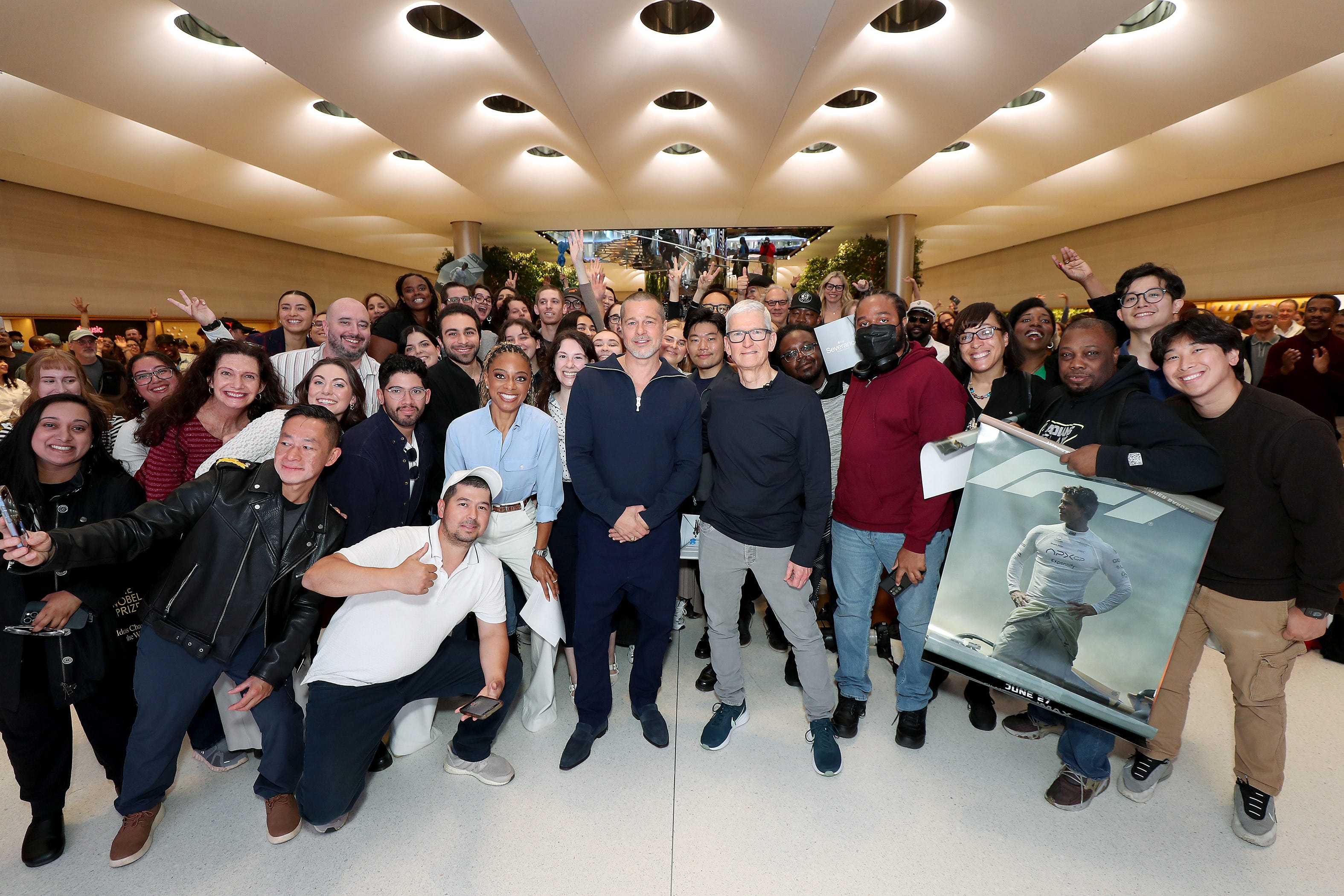 Brad Pitt and Tim Cook during a surprise appearance at Apple's Fifth Avenue store.
