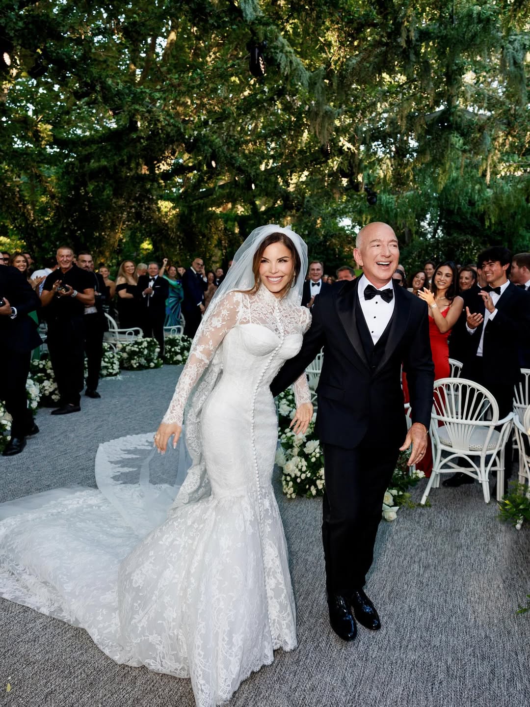 Lauren Sanchez and Jeff Bezos in wedding attire. 
