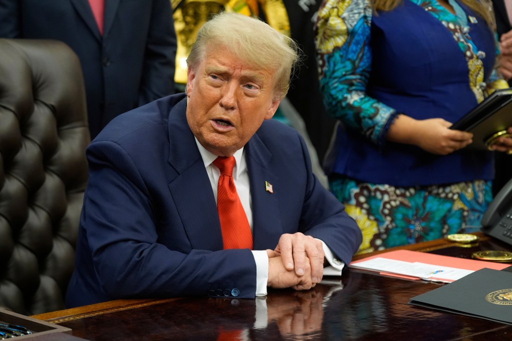 President Donald Trump speaking with Congo's and Rwanda's foreign ministers.