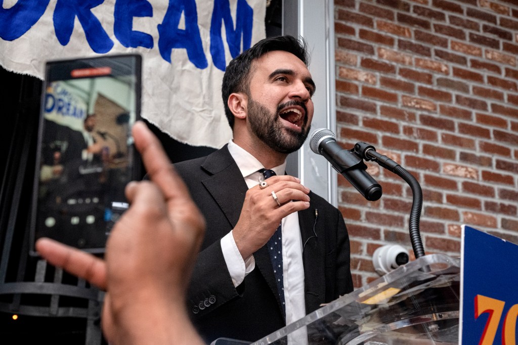Zohran Mamdani giving an acceptance speech.