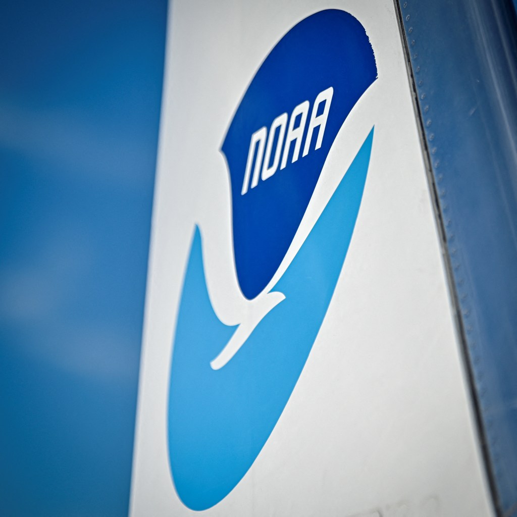 NOAA logo on a blue and white surface.