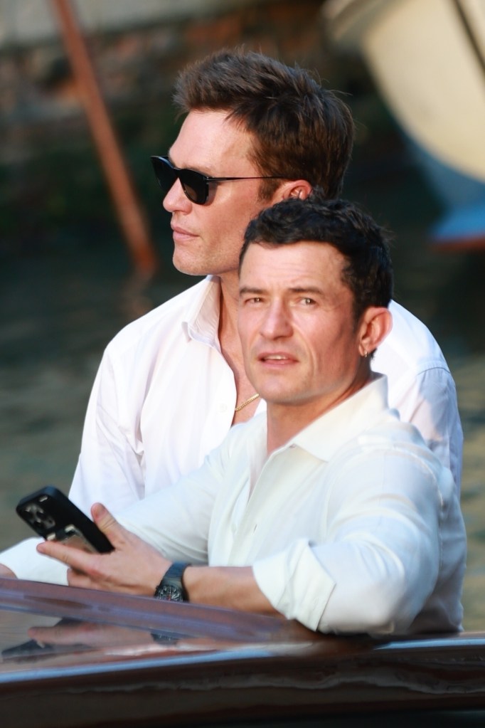 Tom Brady and Orlando Bloom on a boat. 