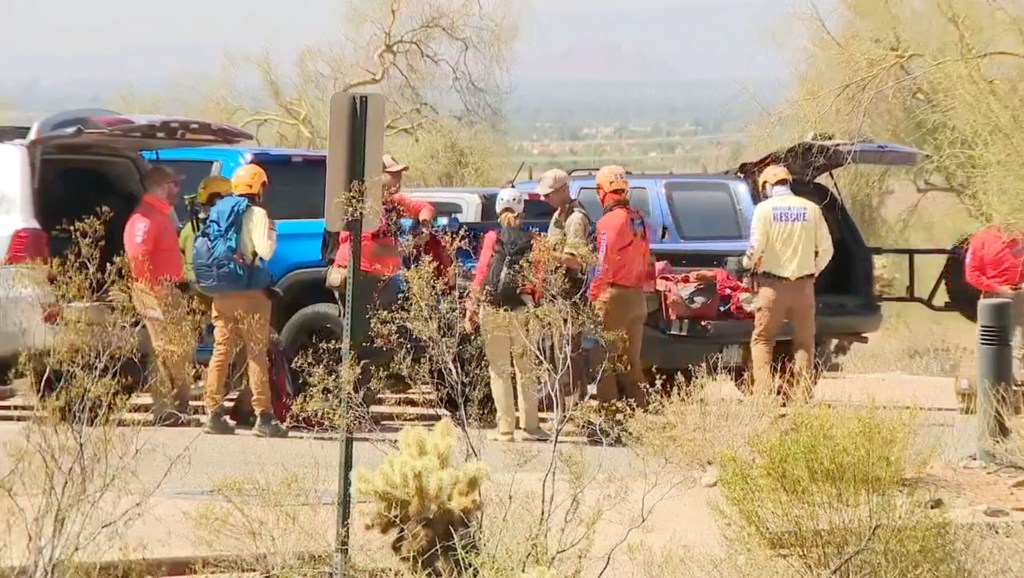 Search and rescue team at a trailhead.