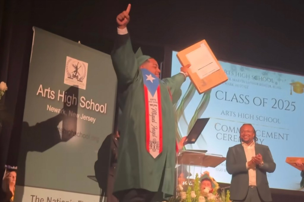 Rodriguez Bermudez celebrates with the crowd at the Arts High School graduation on June 24, 2025.