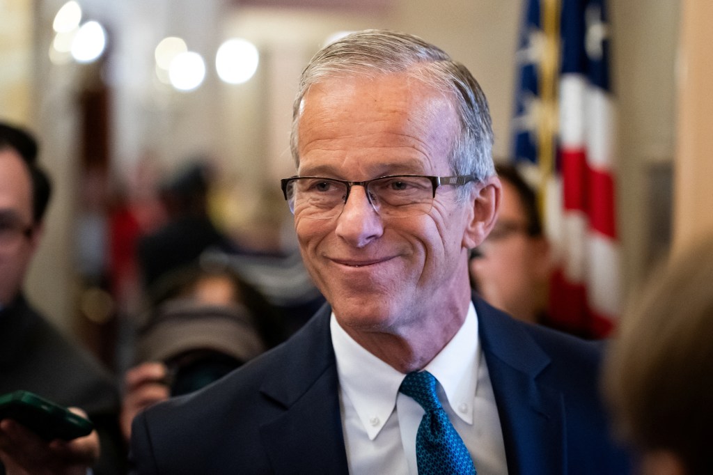 Senator John Thune speaking to reporters.