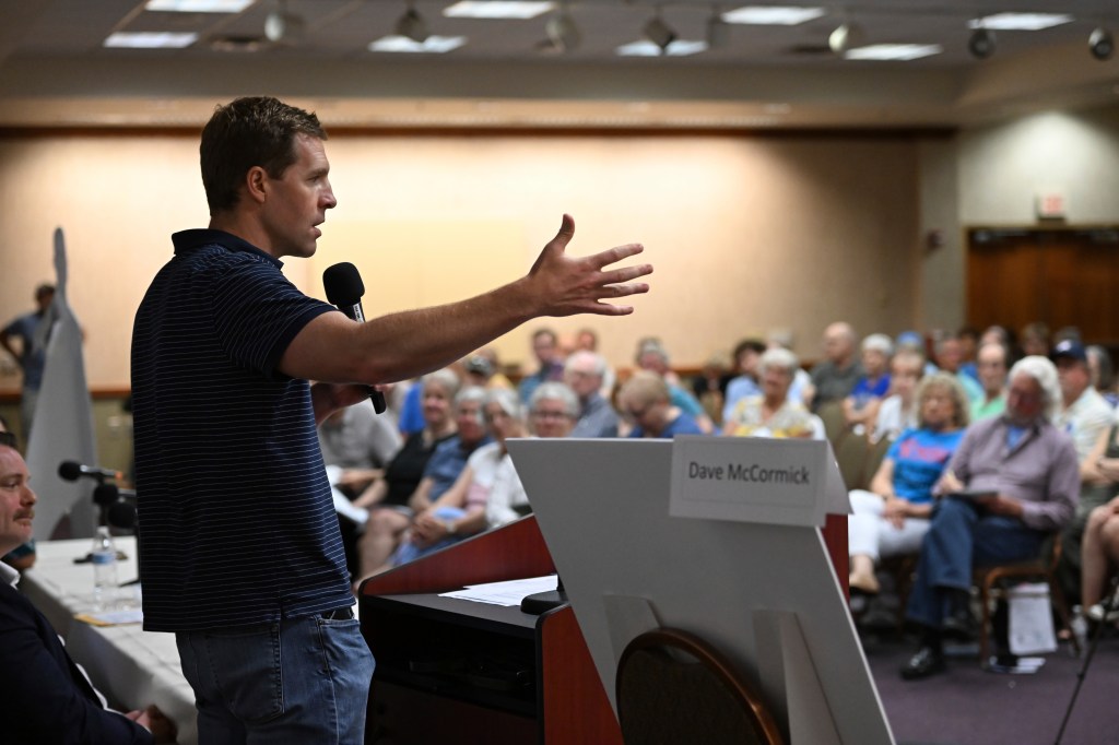 Dave McCormick speaking at a town hall.