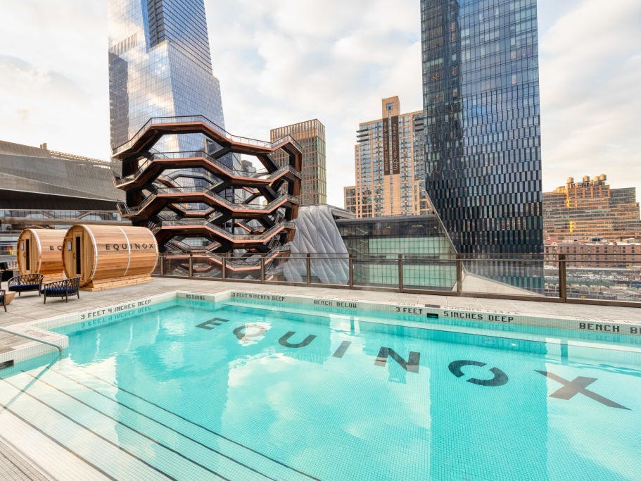Photo of a rooftop pool at an Equinox health club.