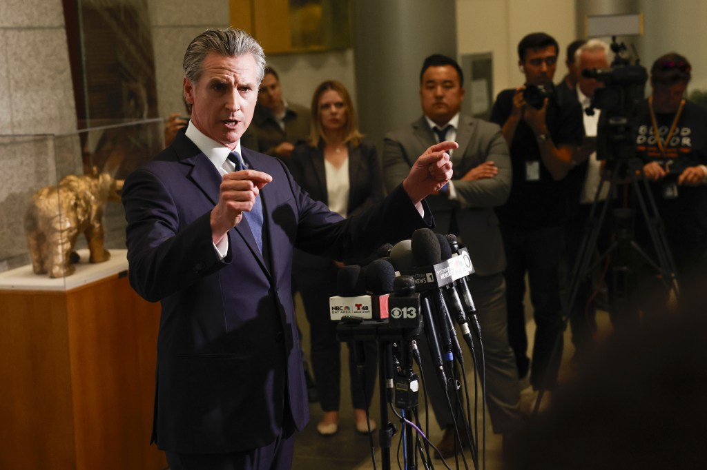 California Gov. Gavin Newsom speaks to reporters in San Francisco, Calif. in June 12, 2025.