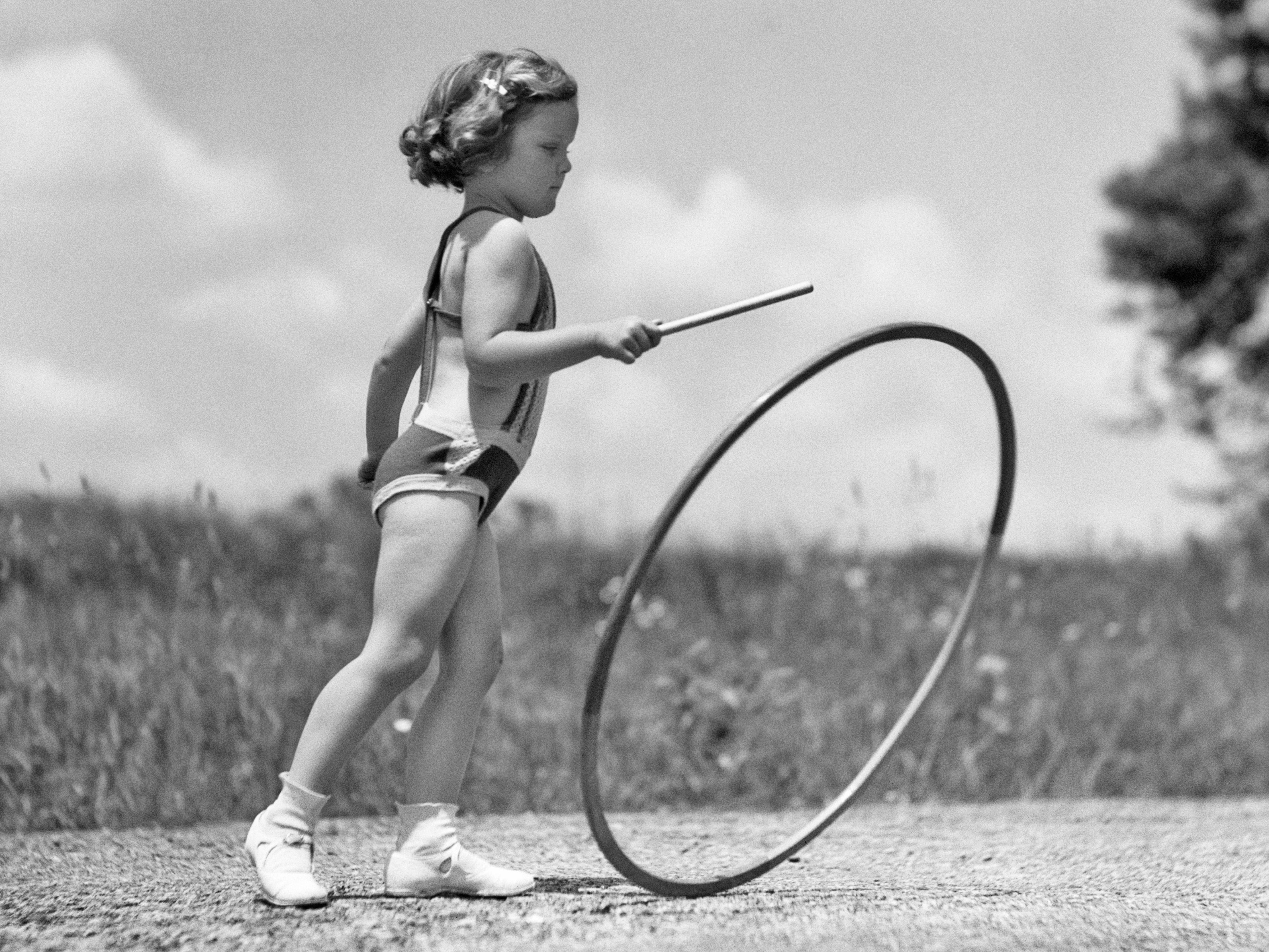 girl playing with hoop