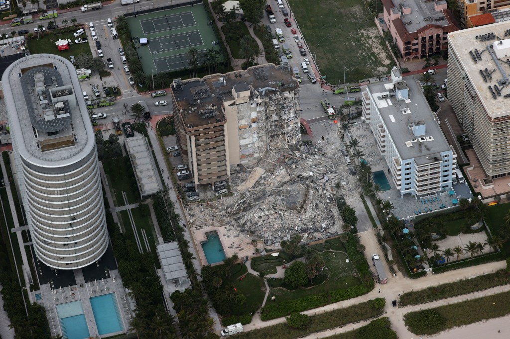 Aerial view of a partially collapsed residential building in Miami.