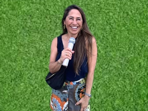 Woman posing with microphone