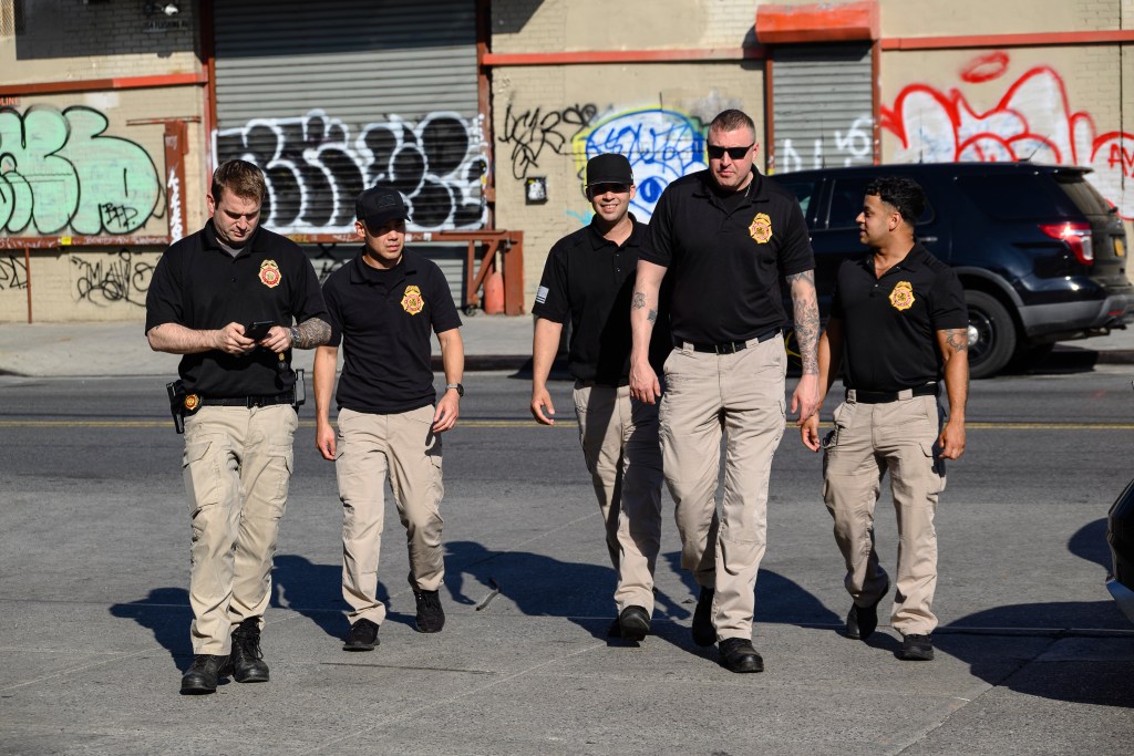 FDNY fire marshals walking after seizing illegal fireworks.