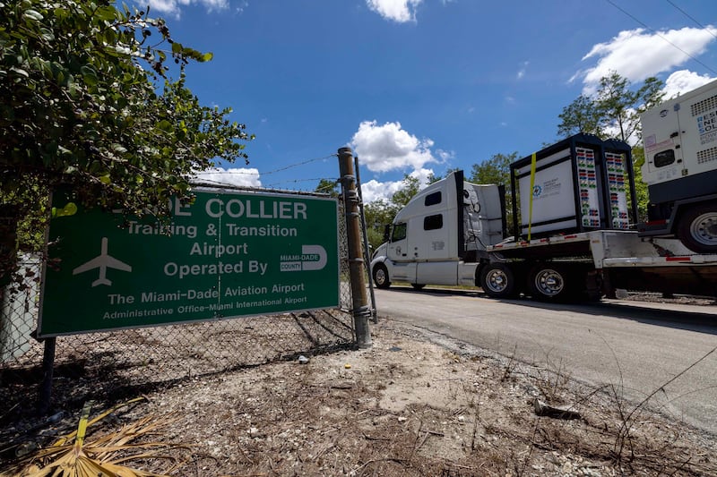 Heavy duty generators are driven into Dade Collier Training and Transition Airport as Gov. Ron DeSantis prepares for the opening of "Alligator Alcatraz."