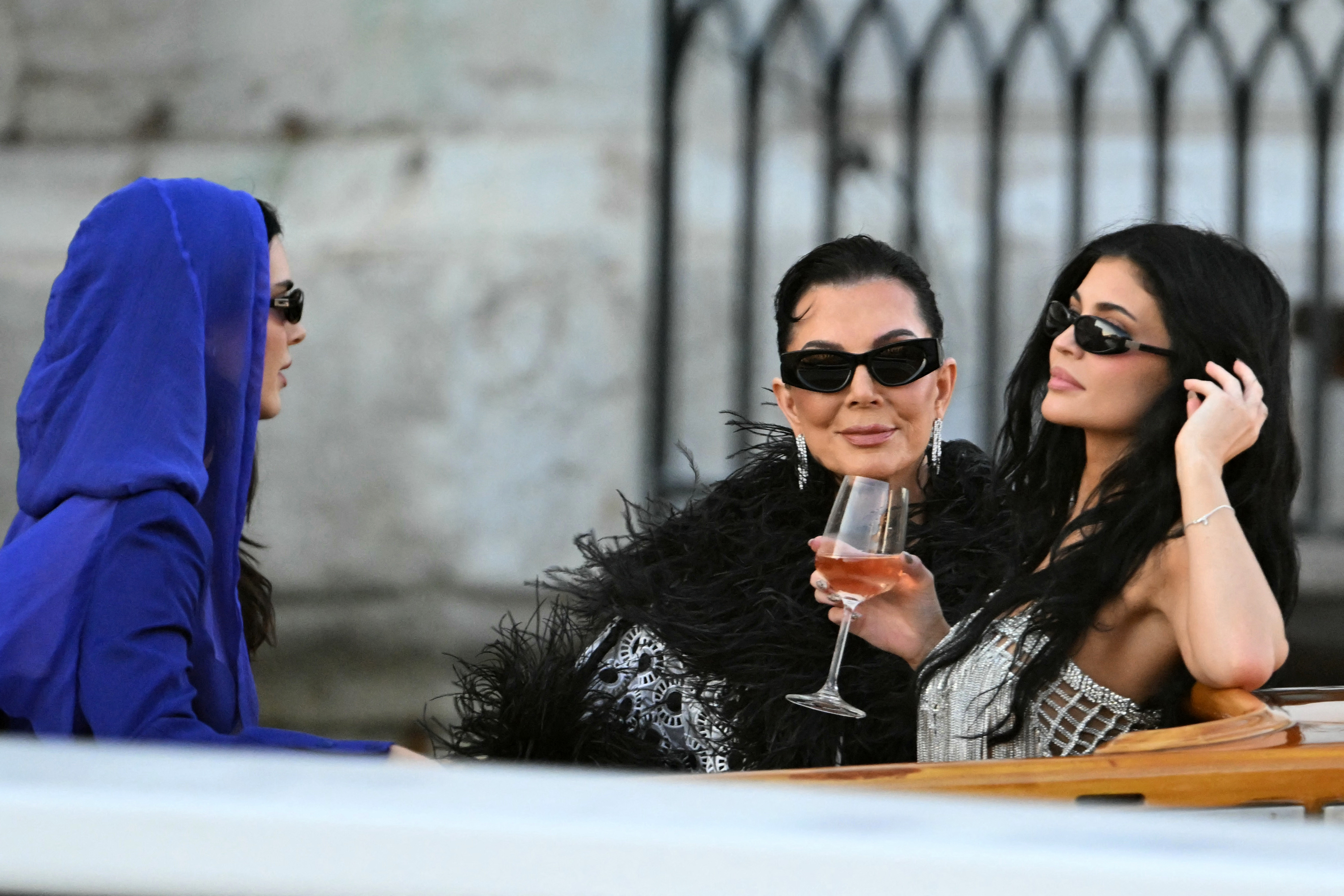 Kendall Jenner, Kris Jenner and Kylie Jenner in a water taxi.