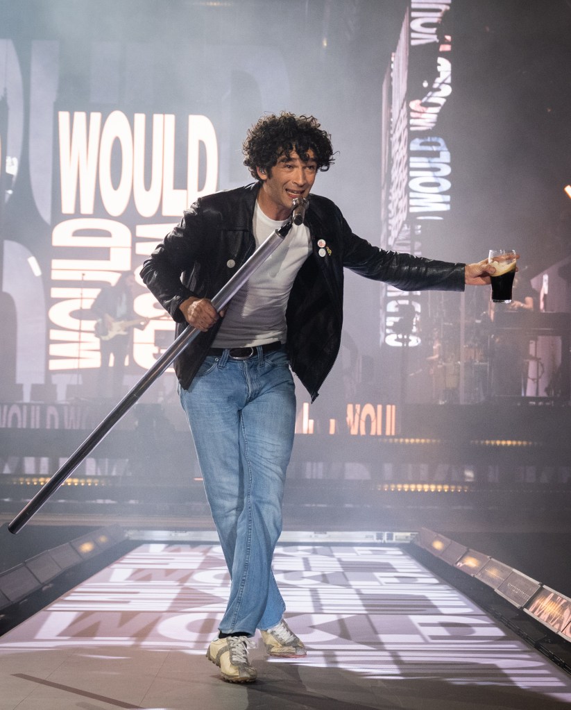 Matty Healy of The 1975 performs as the band headline the Pyramid stage during day three of Glastonbury festival 2025 at Worthy Farm, Pilton on June 27, 2025 in Glastonbury, England. 