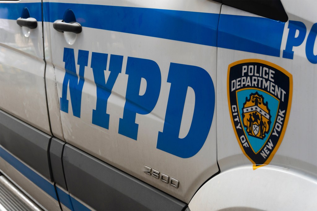 NYPD vehicle side panel with logo.