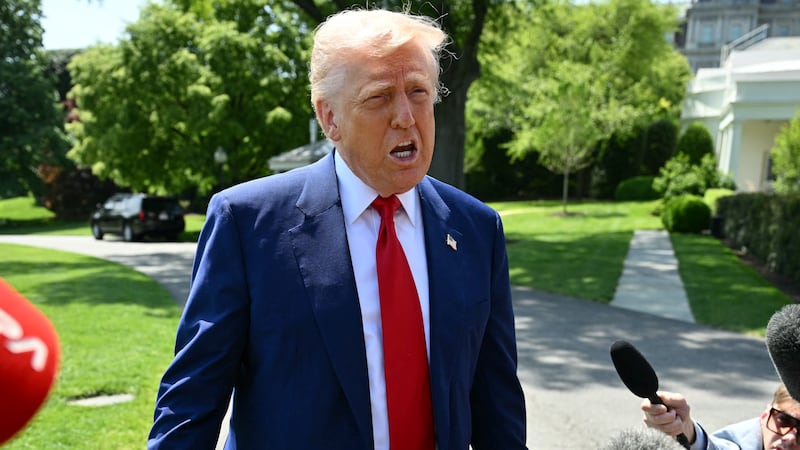 President Donald Trump praised billionaire Jeff Bezos before heading to Michigan on April 29 after Amazon scrapped a plan to display tariff costs for consumers.