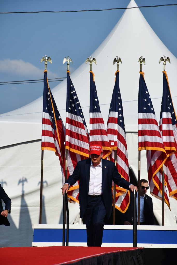 President Donald Trump walking onto a stage in Butler, Pennsylvania.