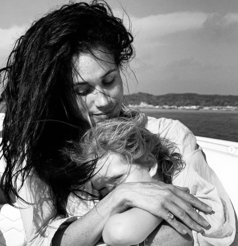 On a boat with her daughter, Lilibet