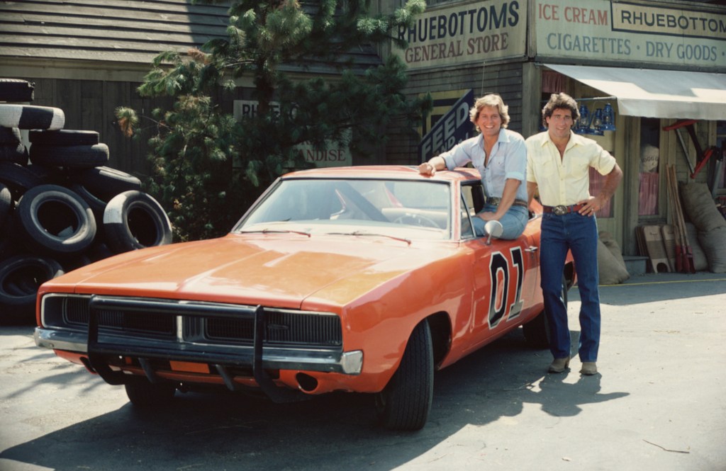 Byron Cherry and Christopher Mayer with the General Lee from *The Dukes of Hazzard*.