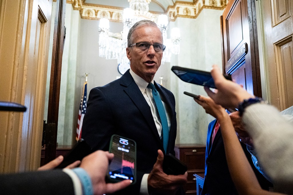 Senator John Thune speaking to reporters in the Capitol.