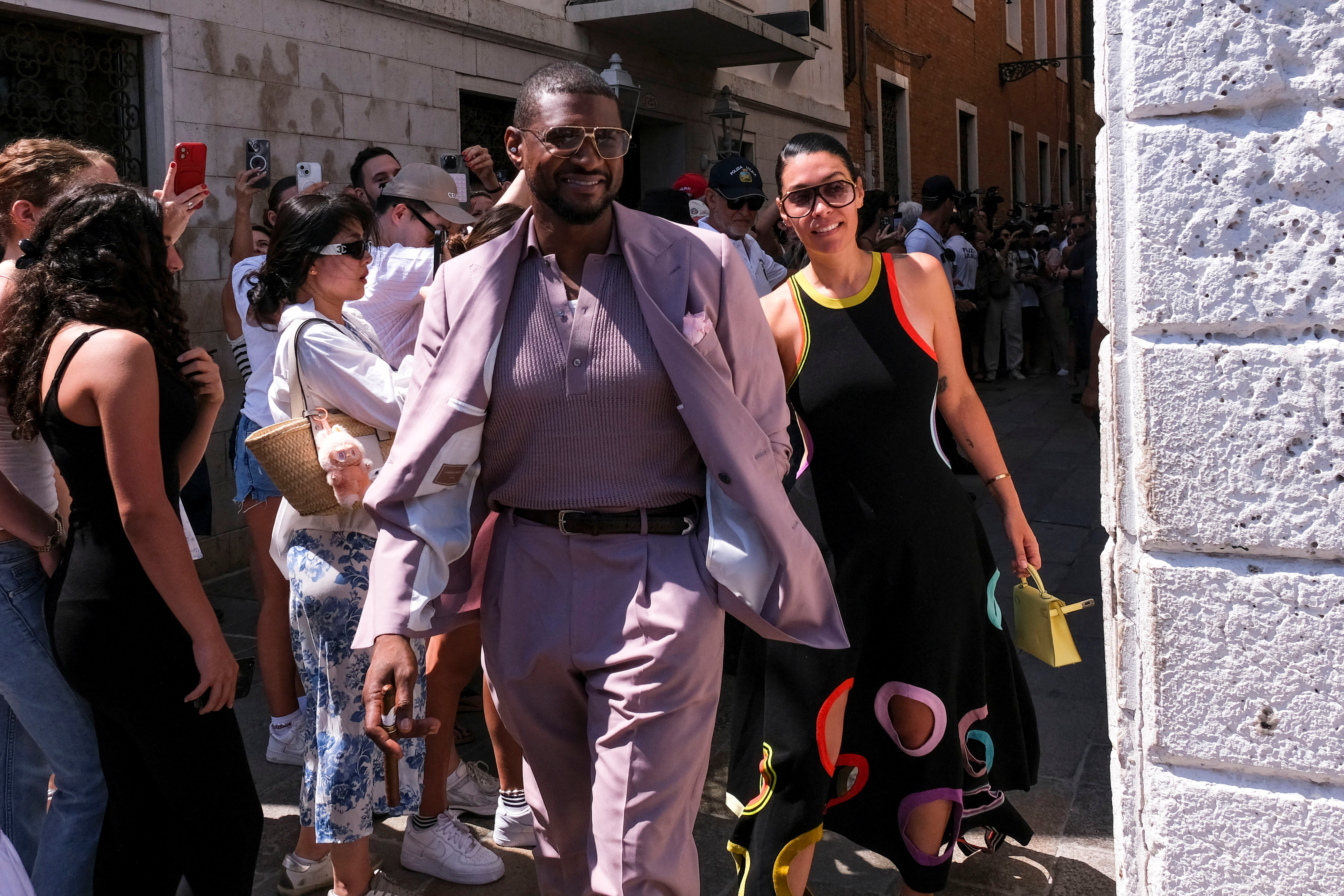 Usher and his wife, Jennifer Goicoechea, in Venice