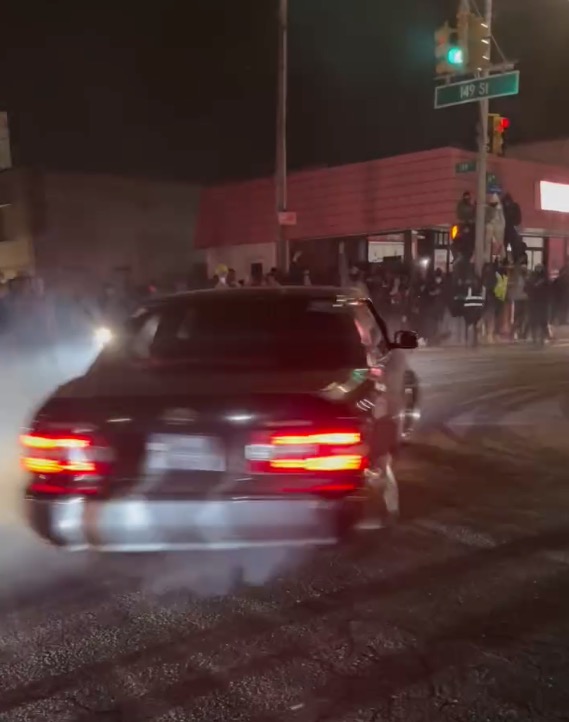 A car seen doing donuts at a Queens car meetup.