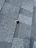 Hole in a roof caused by space debris.