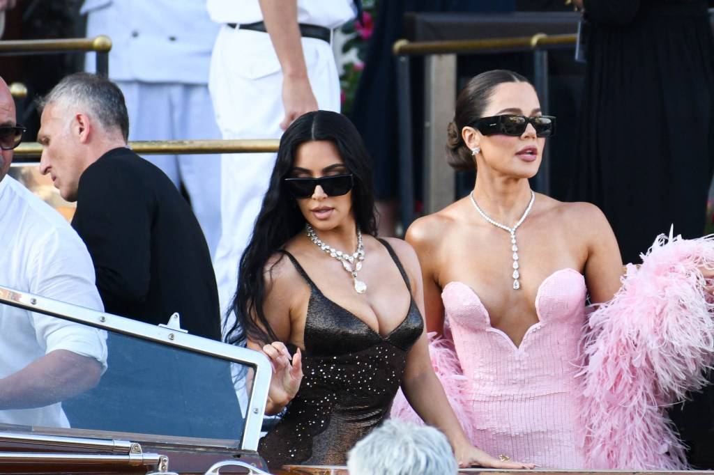 Kim Kardashian and Khloe Kardashian are spotted leaving the Gritti Palace hotel in Venice, Italy