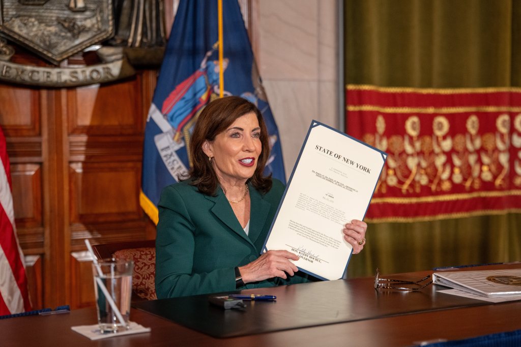 Governor Kathy Hochul signing a Homeland Security bill.