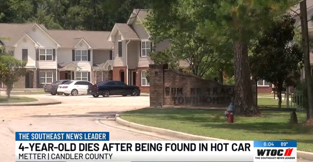 The boy was found dead inside the passenger area of a hot car in the apartment complex's parking lot during the search and was pronounced dead at the scene.