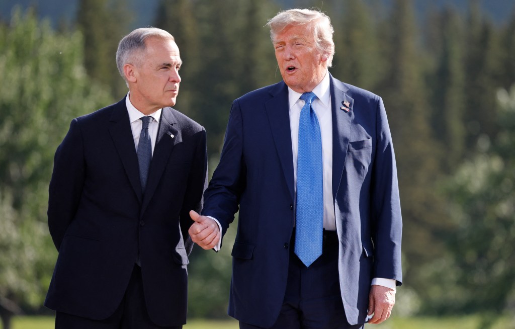 Mark Carney and Donald Trump at the G7 Summit.