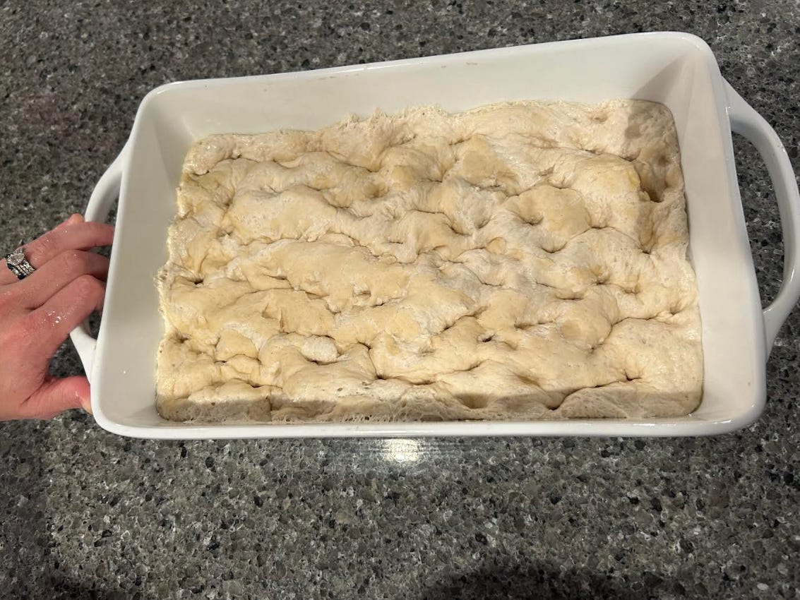 The dimpled focaccia dough, courtesy of writer.
